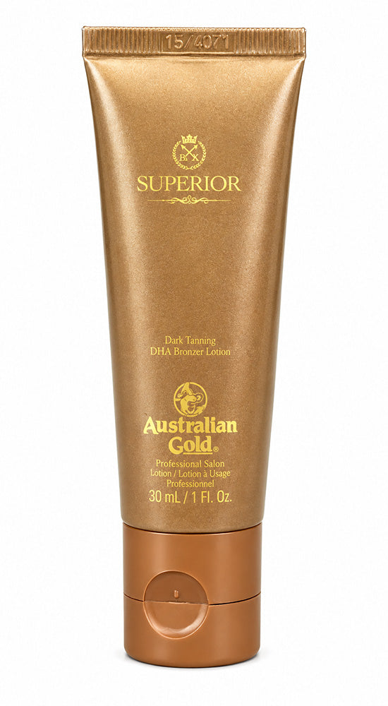 Australian Gold Superior Dark Tanning DMA Retained Lotion in a 30 mL squeeze tube, featuring a metallic gold and bronze color scheme with gold lettering.