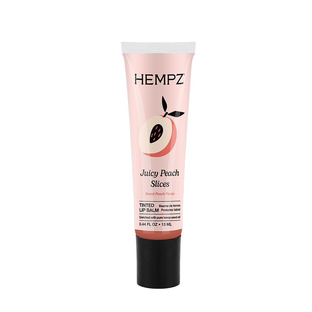 Hempz Juicy Peach Slices lip balm tube on a white background