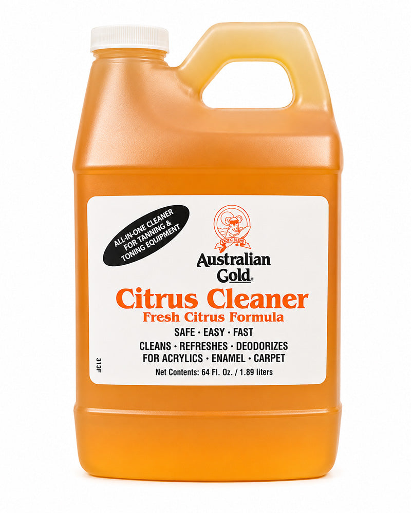A clear 64 fl. oz. container with an orange color citrus cleaner inside, featuring a white label with the Australian Gold logo and title "Citrus Cleaner" 