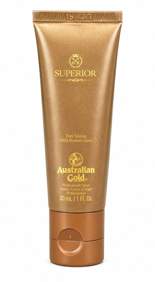Australian Gold Superior Dark Tanning DMA Retained Lotion in a 30 mL squeeze tube, featuring a metallic gold and bronze color scheme with gold lettering.