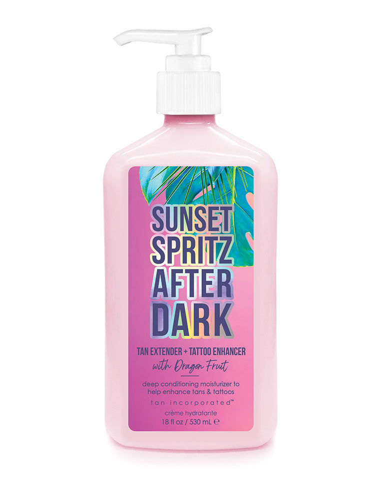 Pink bottle of 'Sunset Spritz After Dark' with colorful label on a white background