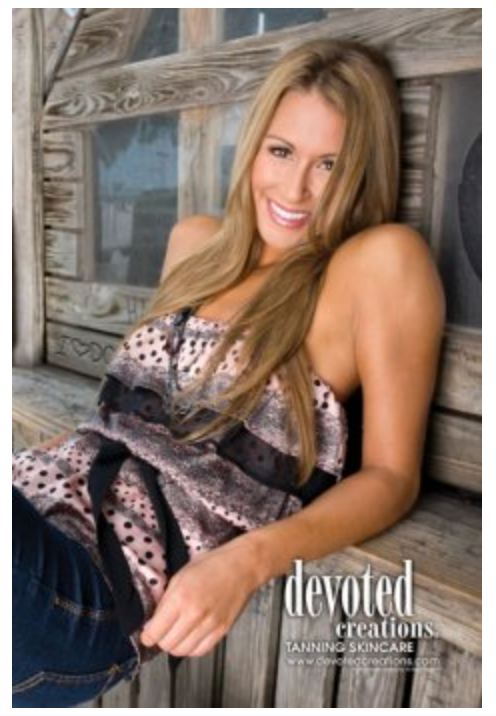 Woman sitting on a wooden bench with 'devoted creations' tanning skincare branding.