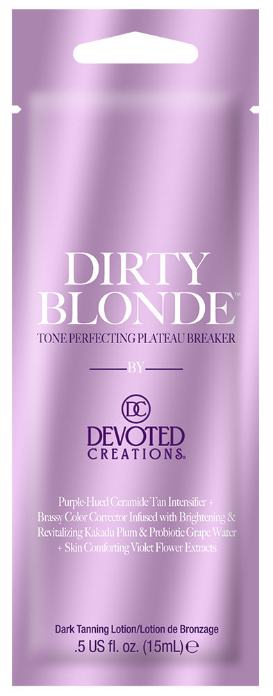 A single use packet of Devoted Creations Dirty Blonde Tone Perfecting Plateau Breaker hair color lotion, featuring a metallic lavender-purple background