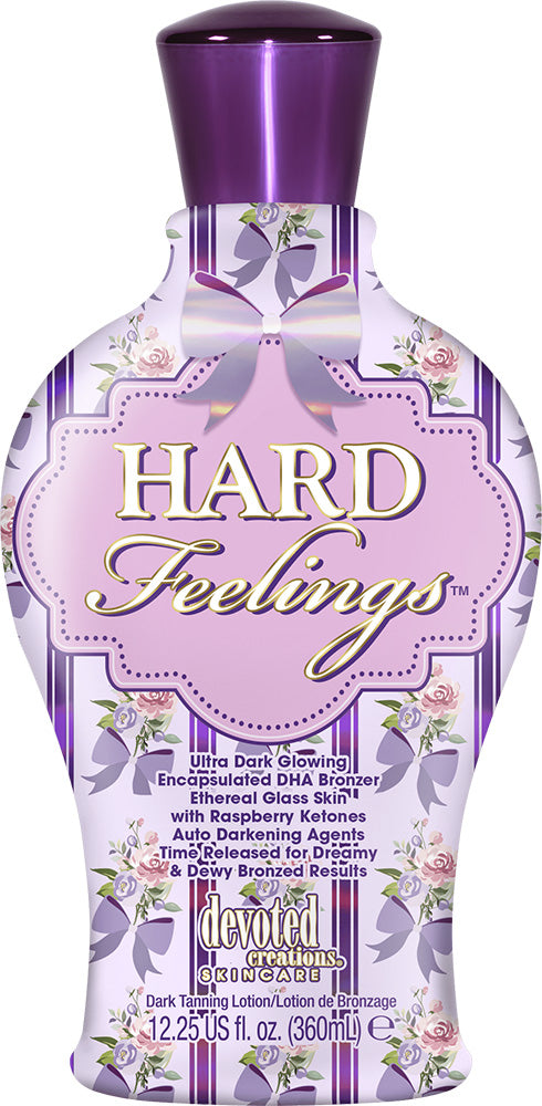 Bottle of 'Hard Feelings' Devoted Creations dark bronzing lotion with floral design and purple cap.