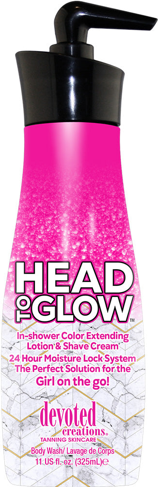 A pump bottle of Devoted Creations Head To Glow shaving cream with pink and white color scheme