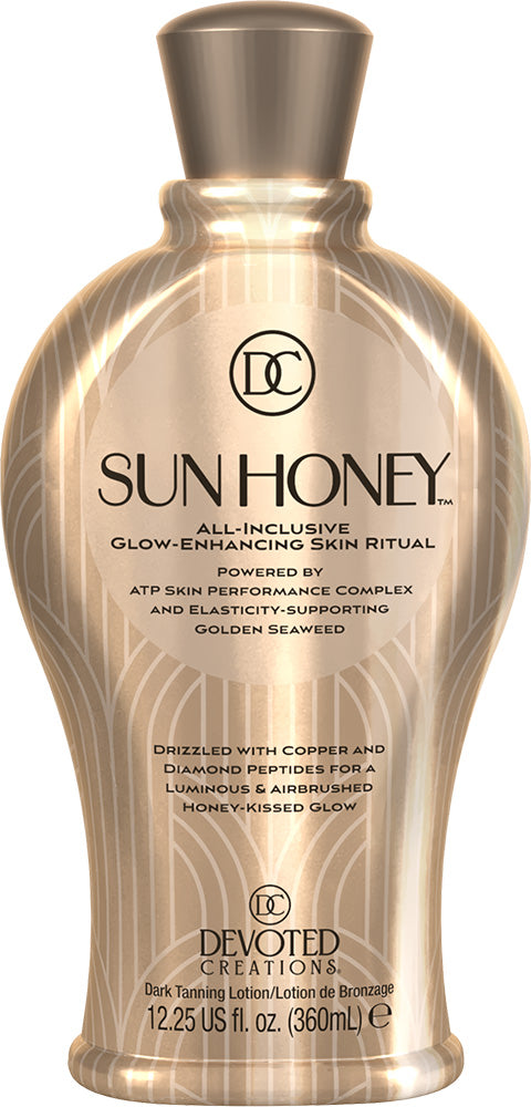 Sun Honey tanning lotion bottle with gold and bronze design