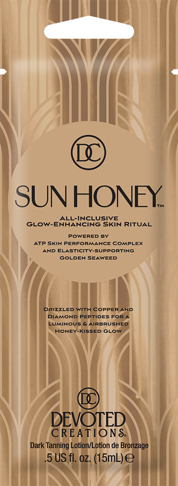 Sun Honey skincare product packaging with Devoted Creations branding