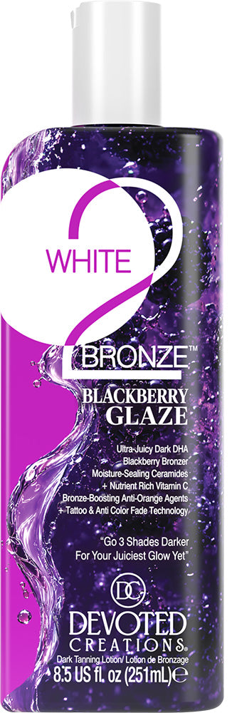 A bottle of Devoted Creations White 2 Bronze Blackberry Glaze tanning lotion, featuring a purple and black label with a white cap.
