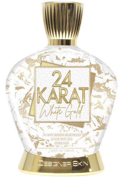 Bottle of 24 Karat White Gold tanning lotion with gold and white design on a white background
