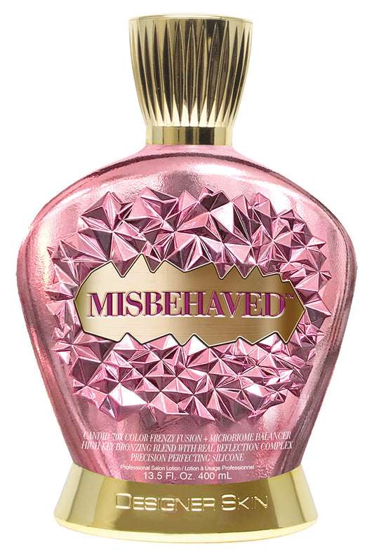 Pink and gold bottle labeled 'Misbehaved' by Designer Skin on a white background