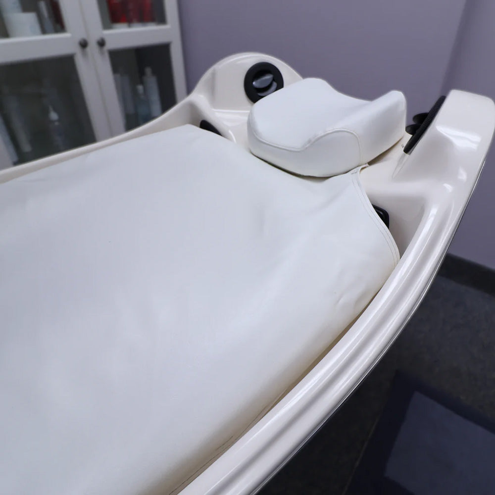 White bed cover on a wellness cocoon in a wellness spa 