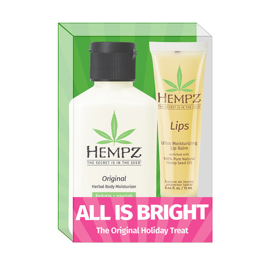 Hempz product set with body moisturizer and lip balm in a decorative box.