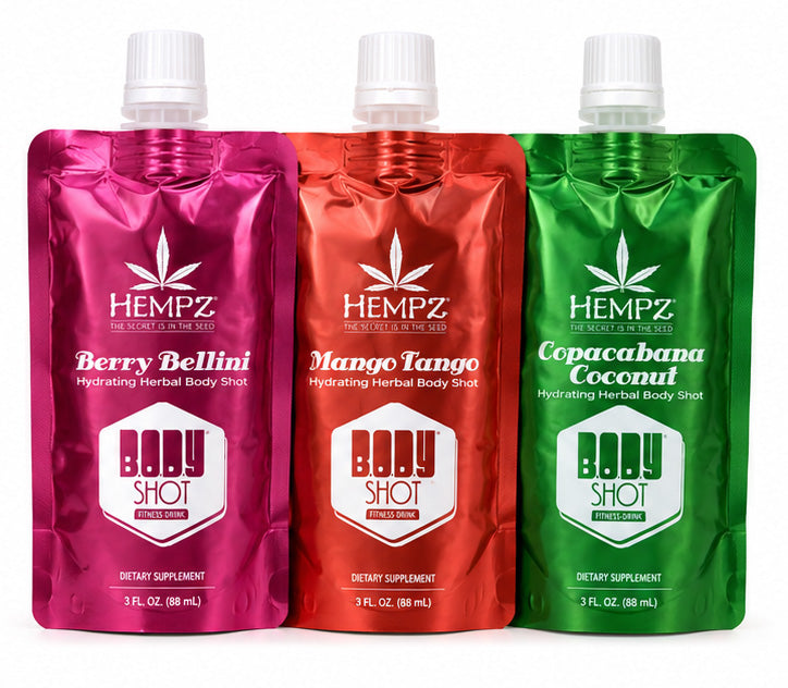 Three Hempz body shot pouches in pink, red, and green on a white background