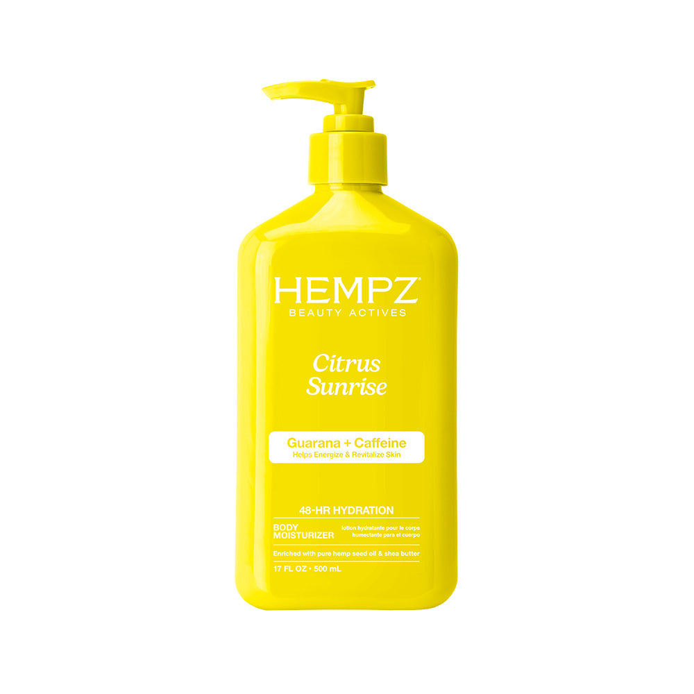 A bright yellow bottle of HEMPZ Beauty Active Citrus Sunrise body moisturizer with a matching yellow pump dispenser, set against a plain white background.