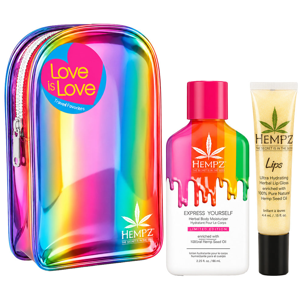 Hempz lip care products including a rainbow-colored pouch, lip gloss, and lip balm on a white background.