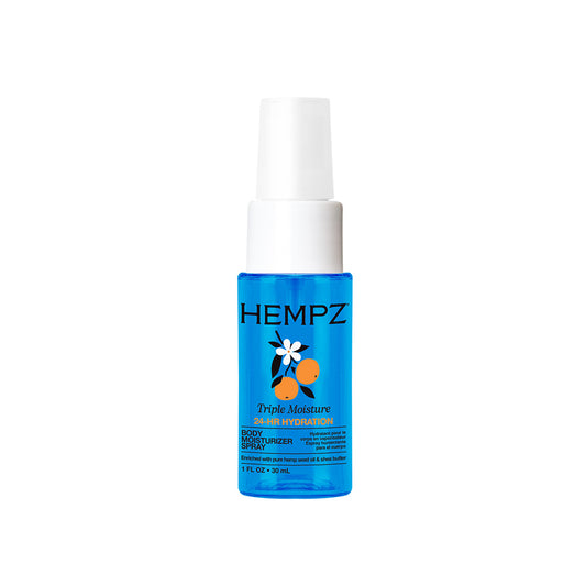 Hempz Triple Moisture Skin Hydration spray in a clear blue bottle with a white spray nozzle, featuring a graphic of a white flower and orange on the label.