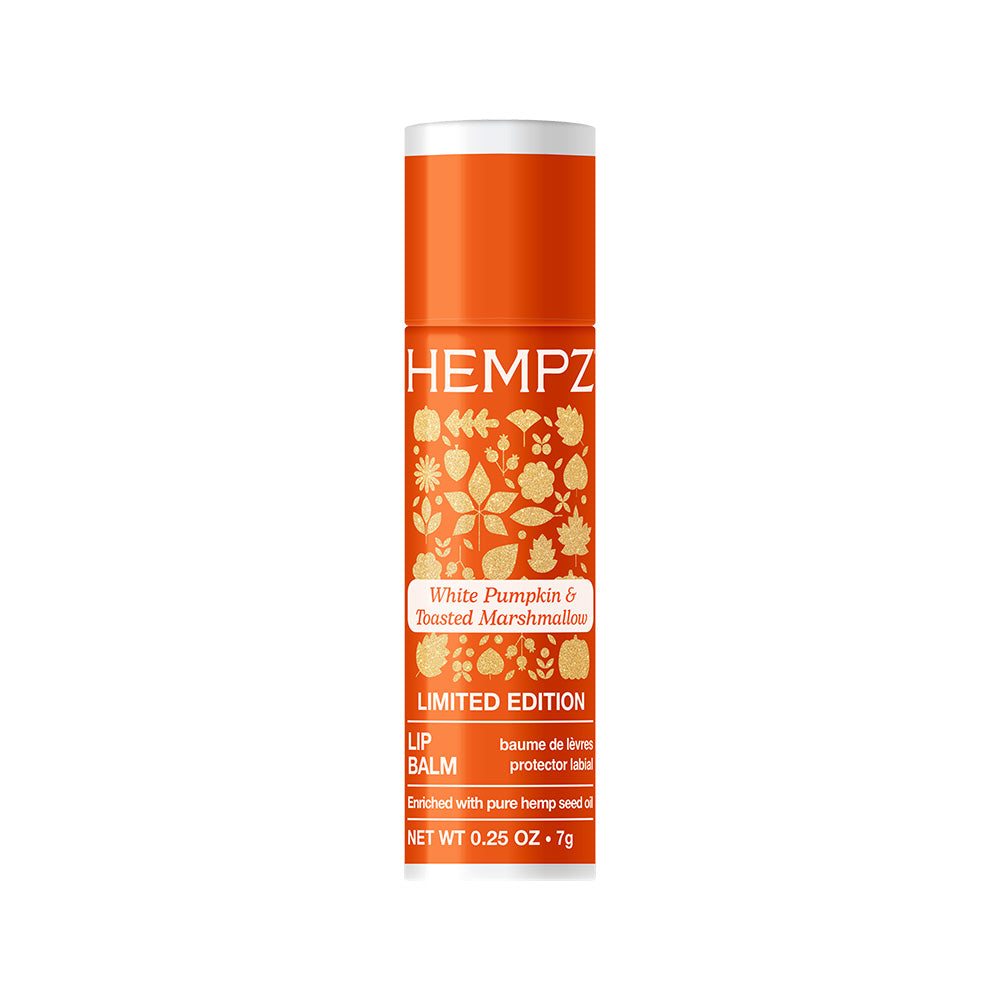 Hempz lip balm tube with orange and white design on a white background