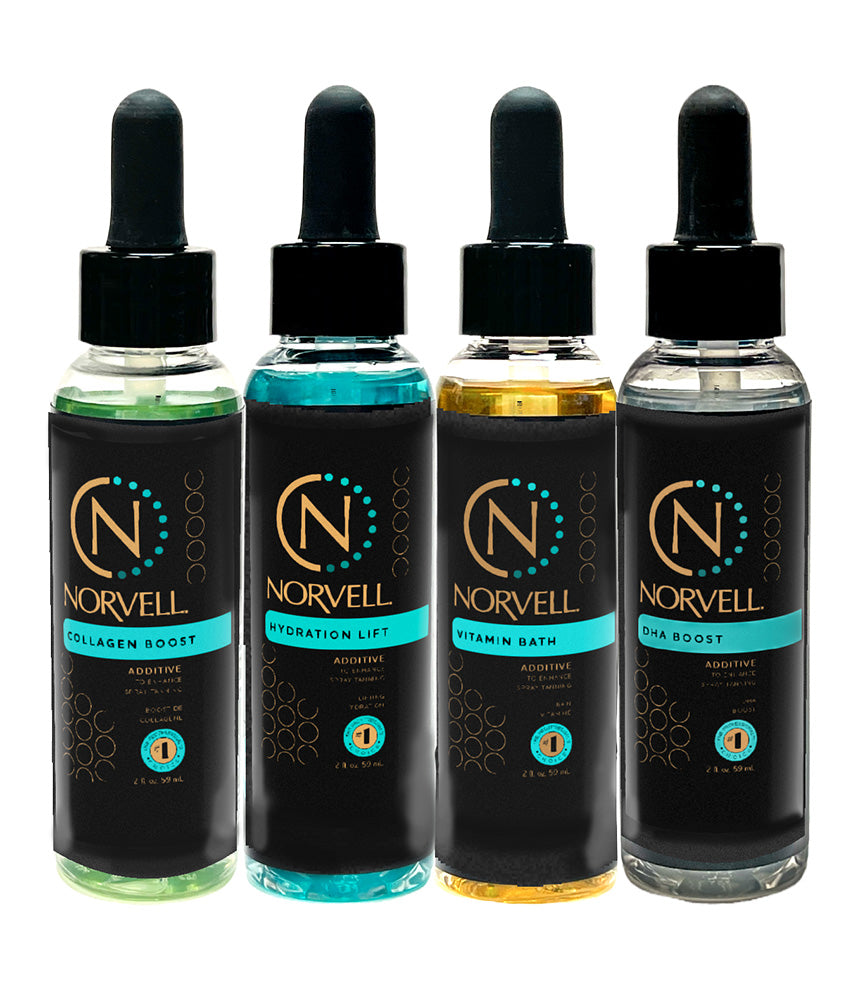 Four Norvell skincare product bottles with droppers on a white background