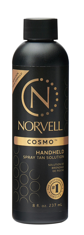 Norvell Cosmo handheld spray tan solution bottle on a white background