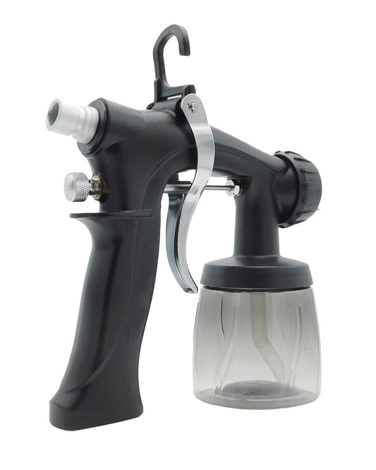 Black spray gun with clear container on a white background