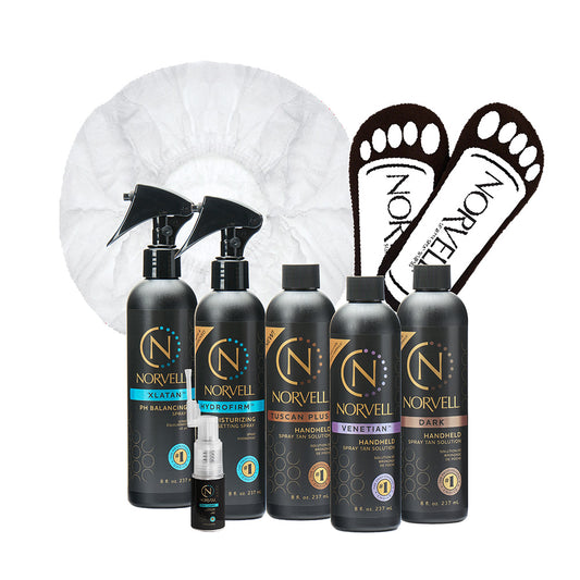 Collection of Norvell spray tan products with a white background