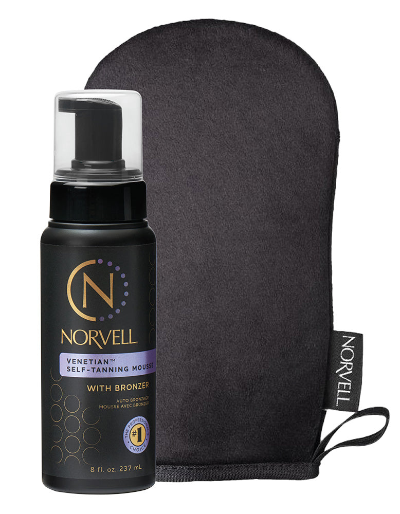 Norvell self-tanning mousse bottle with applicator mitt on a white background