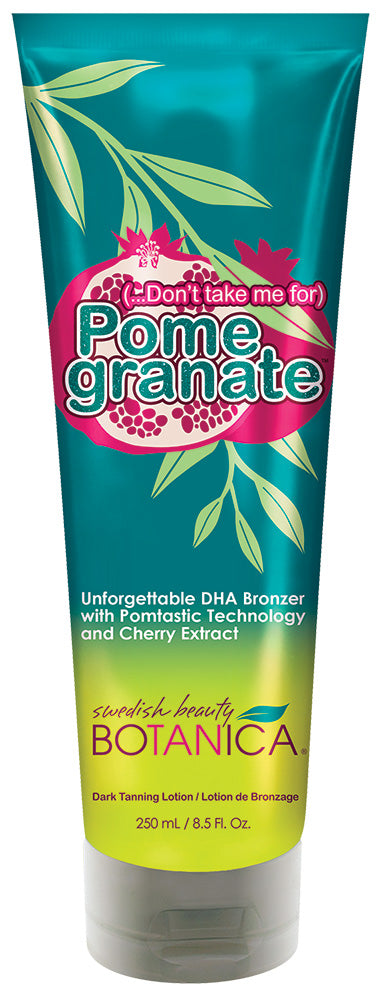 Tube of Botanica Pomegranate tanning lotion with green leaves on a white background