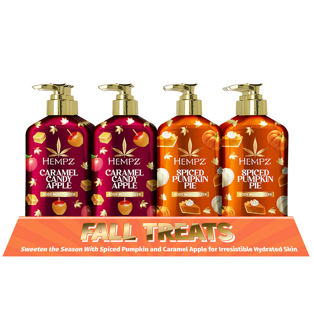 Four bottles of Hempz body wash in Caramel Candy Apple and Spiced Pumpkin Pie scents on a white background.