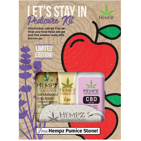 Hempz pedicure kit with products and packaging on a cardboard background