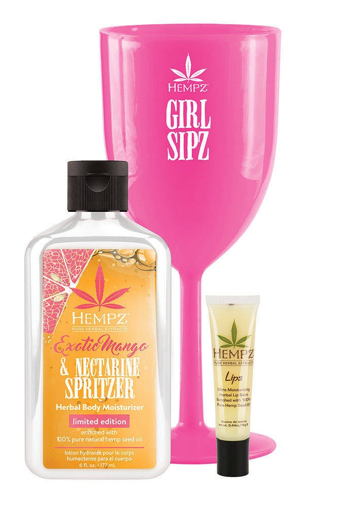 Hempz product set including a pink 'Girl Sipz' glass, bottle, and tube on a white background
