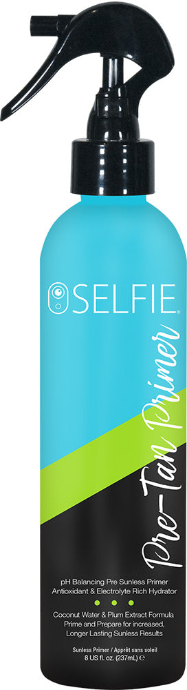 A spray bottle labeled 'Selfie Pre-Tan Primer' with a blue and black color scheme and a white spray nozzle.