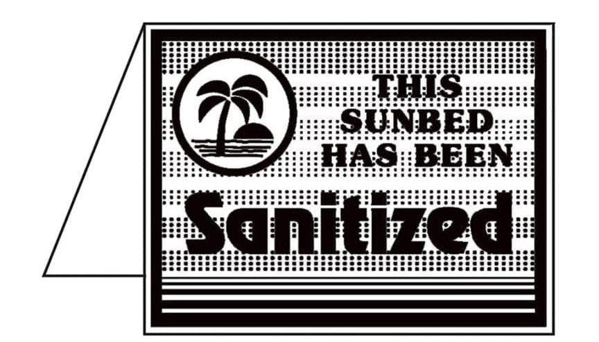 Sign indicating that a sunbed has been sanitized with a palm tree symbol.