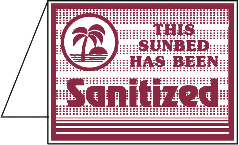 Sign indicating a sunbed has been sanitized with a palm tree symbol.