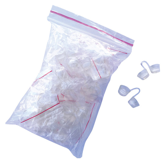 Clear plastic bag with red zipper containing small white objects, with additional white objects on a white background.