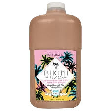Bikini Complete product bottle with palm tree design on a white background