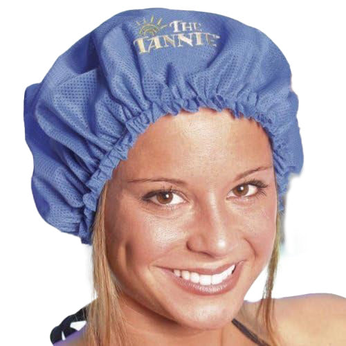 Woman wearing a blue tanning cap on a white background 