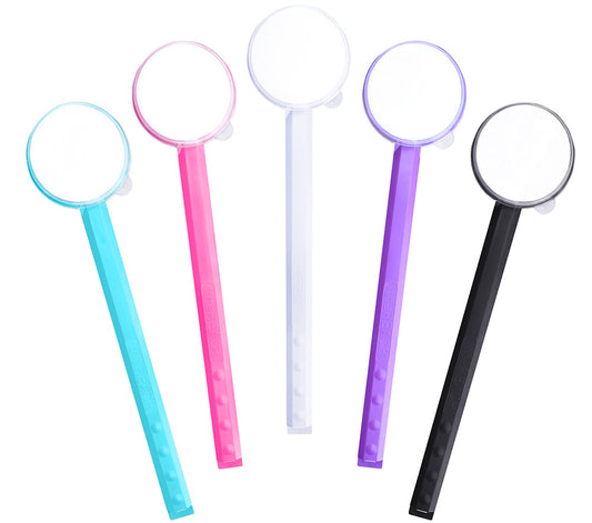 different color tanning lotion applicators on a white background 
