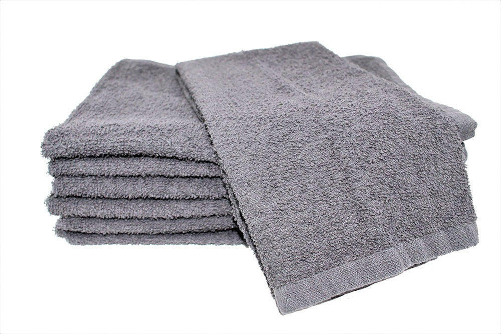 Stack of gray towels on a white background