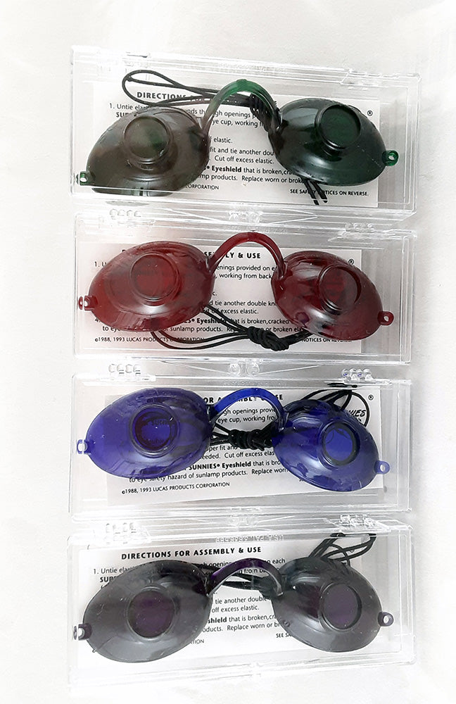 set of eyewear in cases on a white background 